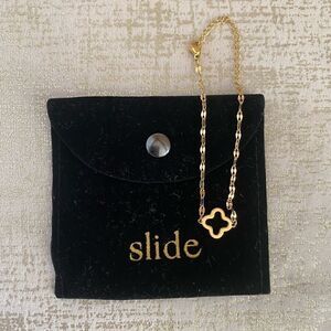 Slide Jewelry Gold Clover Bracelet. NWOT!